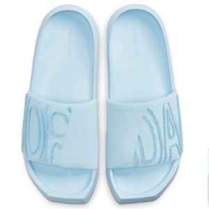 Nike Jordan NOLA Slide Women's Sandals in Celestine Blue.